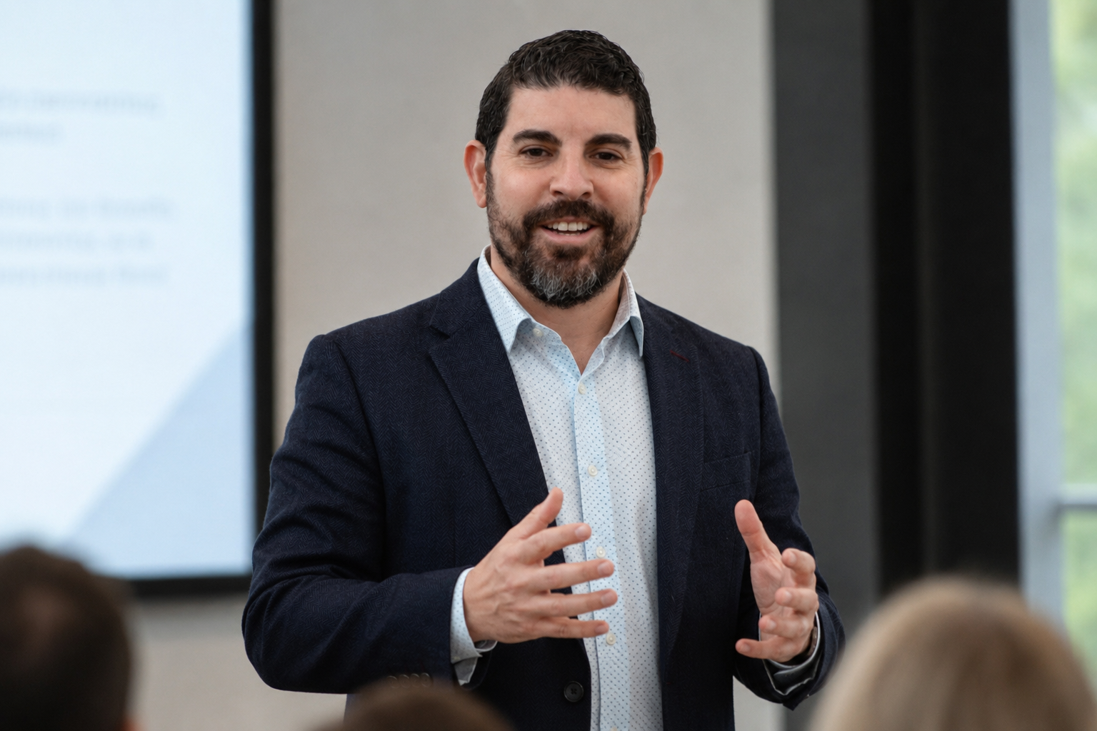 Aaron Nihat delivering an AI Essential Skills workshop
